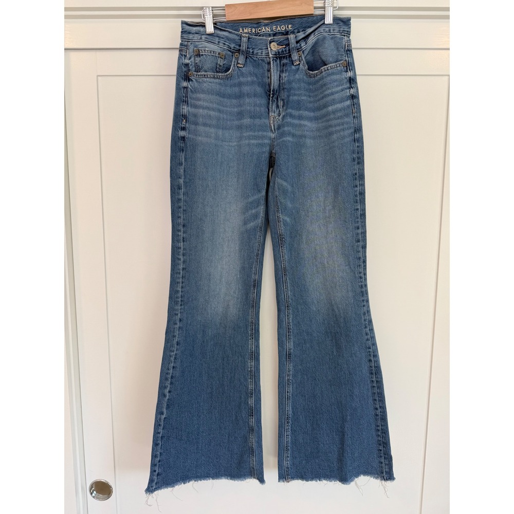 American Eagle Baggy Flare Jeans Medium Wash Raw Hem Size 0 Regular